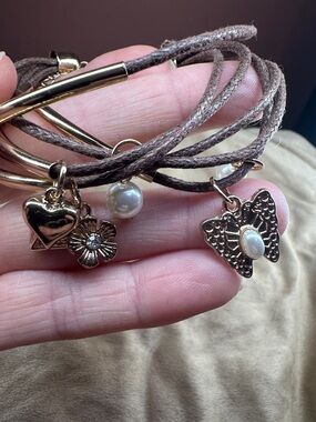 Multi-Strand Brown Cord Bracelet with Gold Charms